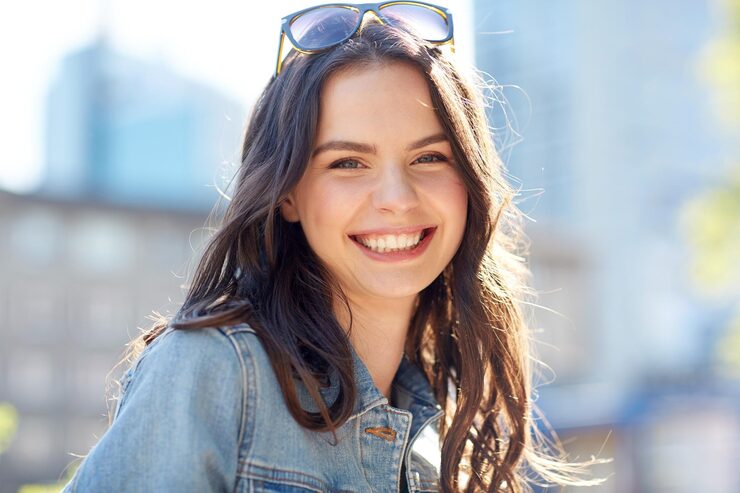 women-people-concept-happy-smiling-young-woman-summer-city-street_380164-140277